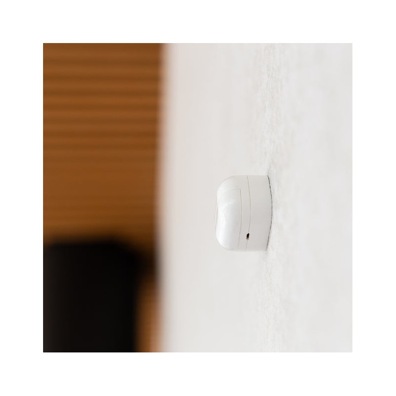 Shelly BLU Motion – biały czujnik ruchu Bluetooth do montażu na ścianie, idealny do inteligentnego domu.