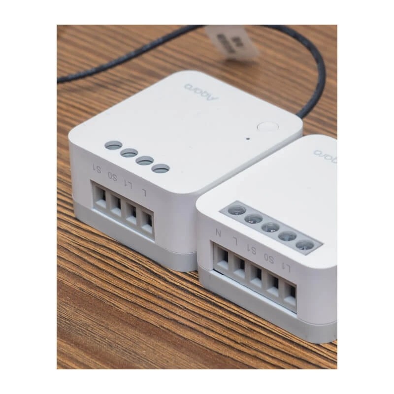 Aqara Single Switch Module T1 SSM-U01 – inteligentny moduł przekaźnikowy Aqara do sterowania oświetleniem przez Zigbee.