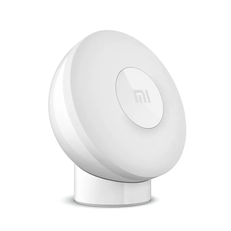 Xiaomi Mi Motion-Activated Night Light - biała bezprzewodowa ładowarka z logo Xiaomi, prezentacja produktu.