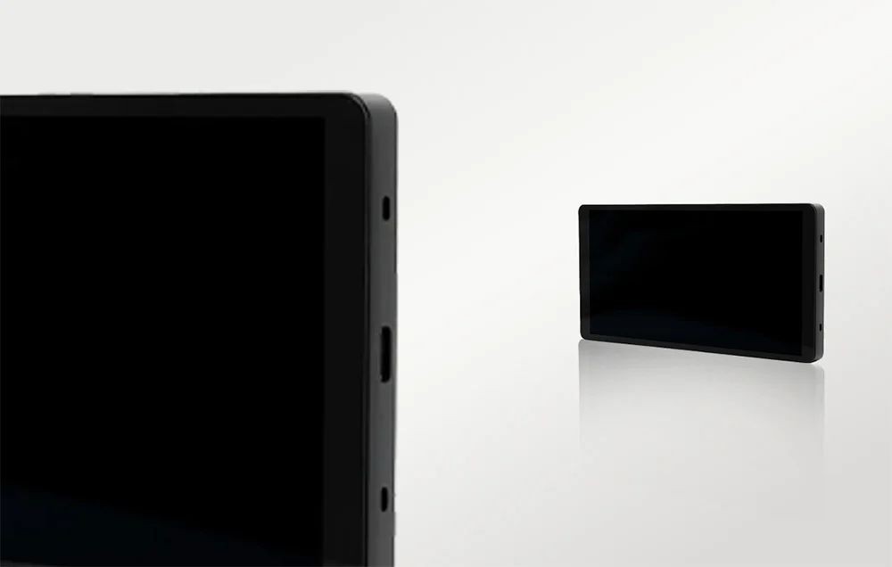 Shelly Wall Display X2I Black - panel montażowy Shelly Wall Display X2I Black – czarne panele montażowe do inteligentnego domu, prezentacja urządzeń.