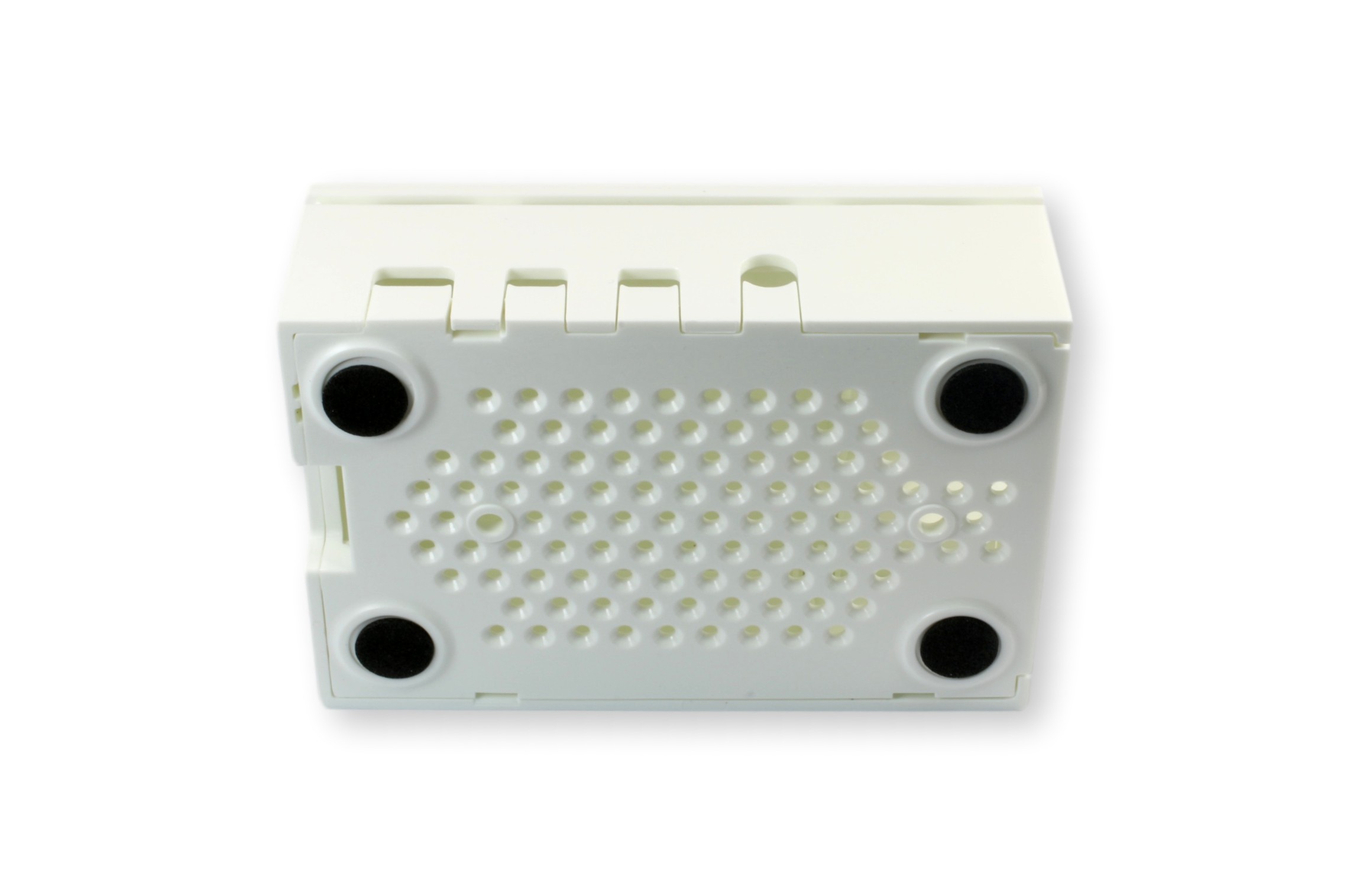 Raspberry Pi 4 Model B 2GB - biały obiekt z perforacją i czarnymi okrągłymi elementami